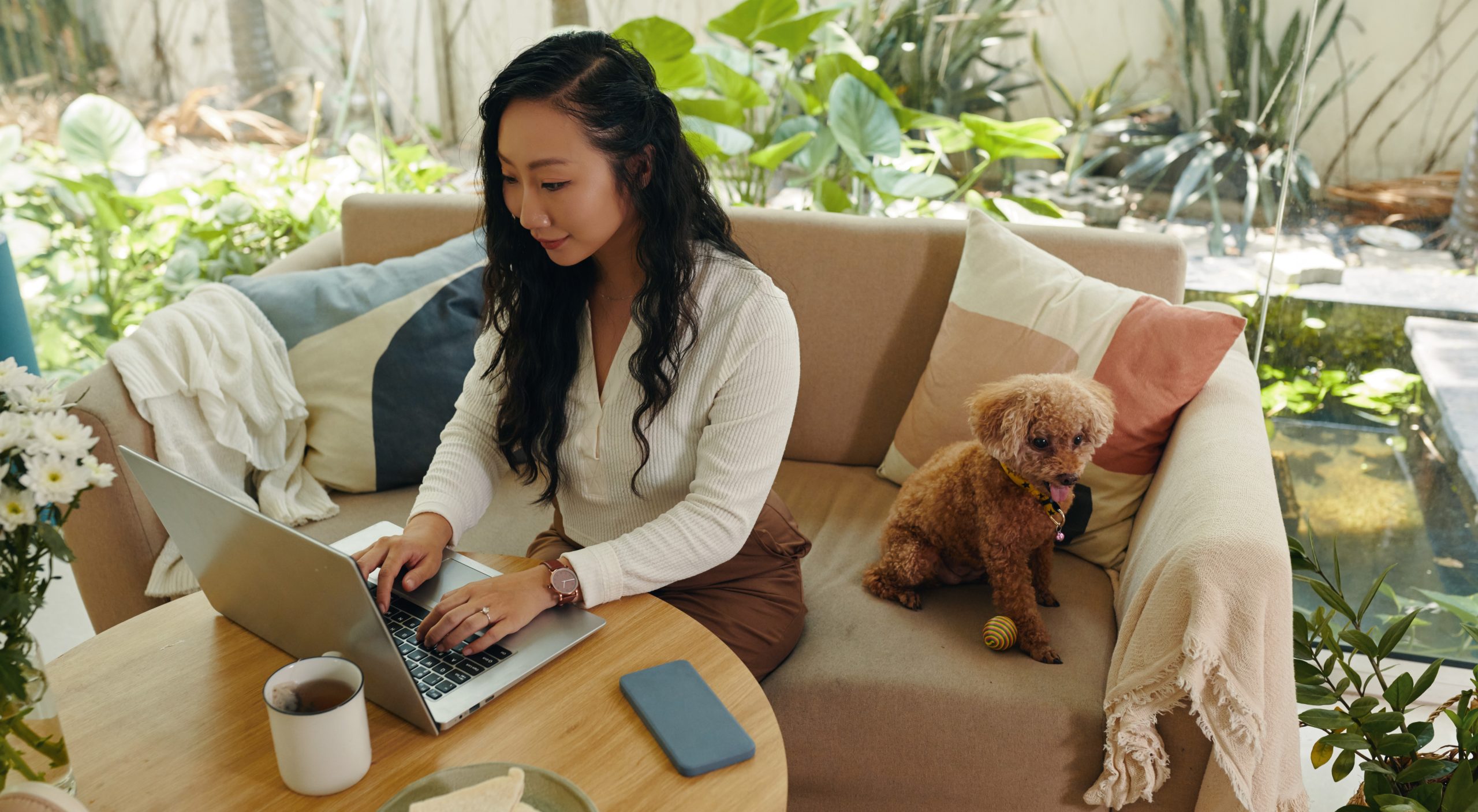 Woman working remotely working from home being productive